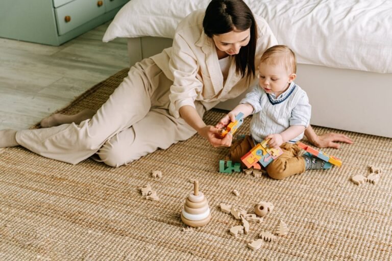 Parent sitting with autistic child during play activity at home
